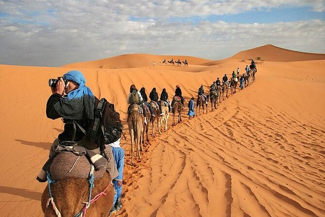 2 Days Sahara Group Tour Fez to Marrakech via Merzouga - Riding into the Erg Chebbi dunes