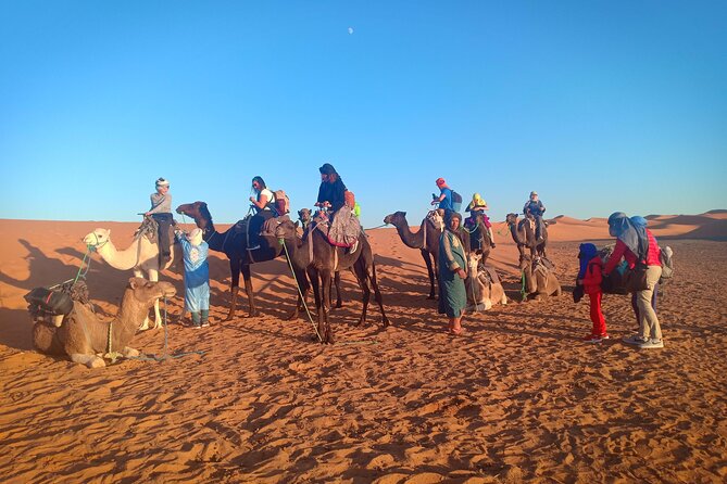3 Days Sahara Tour from Marrakech to Merzouga Dunes - Camel riding into Erg Chebbi at sunset