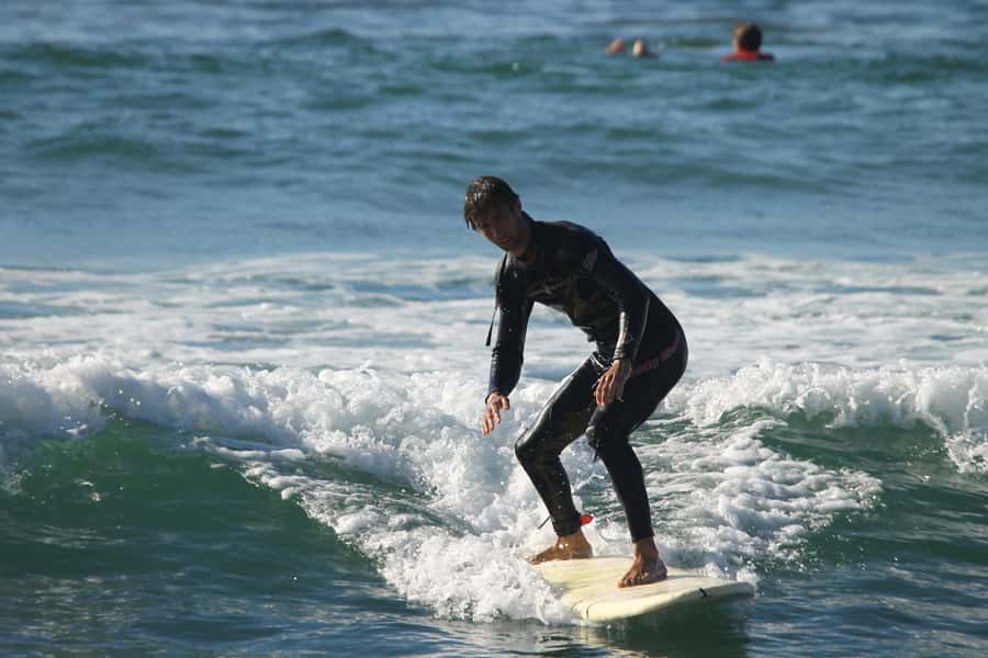Agadir: Taghazout Beach Surf Lesson with Lunch and Transfer - Guided practice in Taghazout’s Atlantic water