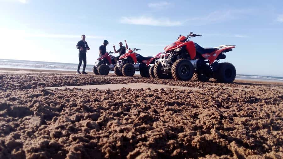 Agadir/Taghazout: Quad Bike and Sandboarding Tour - Riding from the village toward Sidi Toual Beach