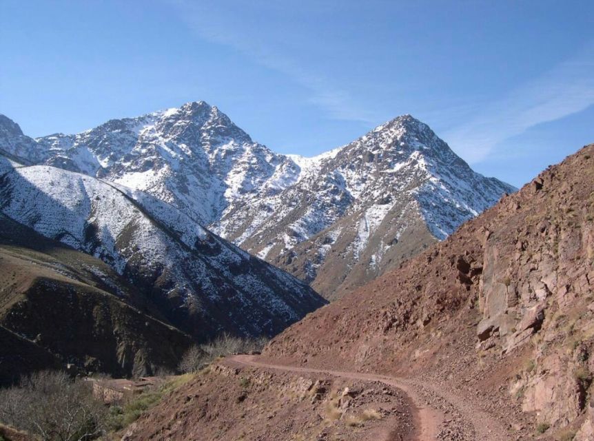 Agafay Desert & Atlas Mountain & Camel Ride Day Trip & Lunch - The one-hour walk to the waterfall