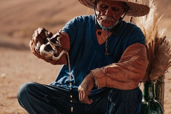 Agafay Desert Dinner show and Camel Ride & Sunset - Berber Music and the Fire Show