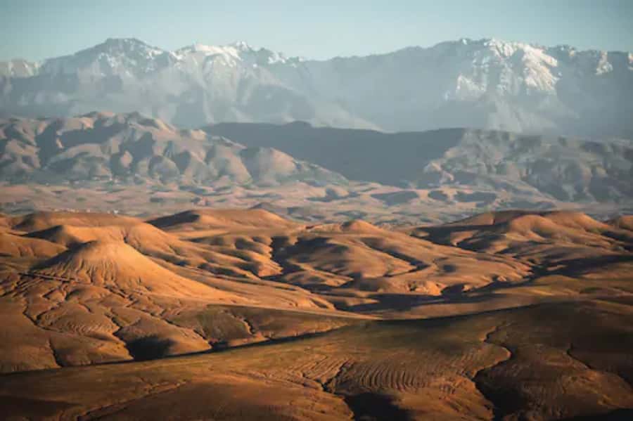 Agafay Desert: Magical Half-Day Lunch with Pool Swim - Tea, music, and the argan oil stop