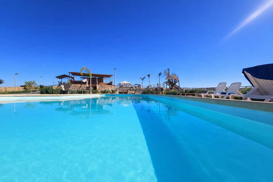 Agafay Desert: Quad, Camel Ride & Luxury Lunch with Pool - Pool time and sunset over Agafay