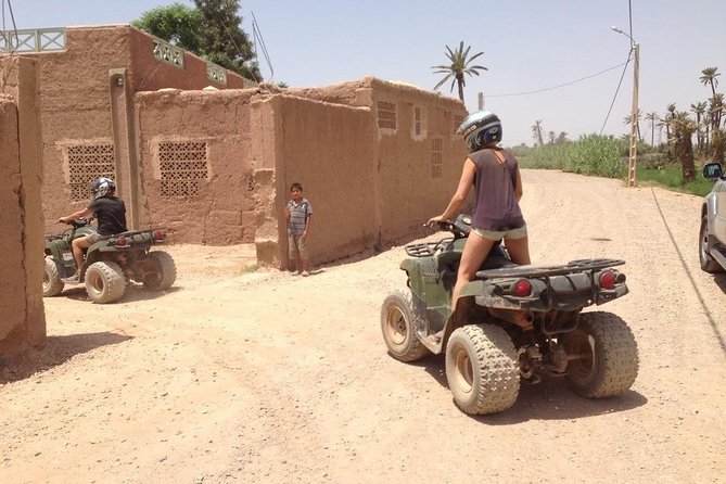 ATV Quad biking in Marrakech desert palmgrove - Palm groves, sandy tracks, and mountain views