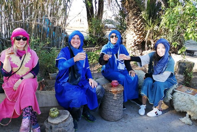 Camel Ride in Marrakech with Hotel-Pick up and Drop-off Included - Wearing a jilbab and Saharan scarf