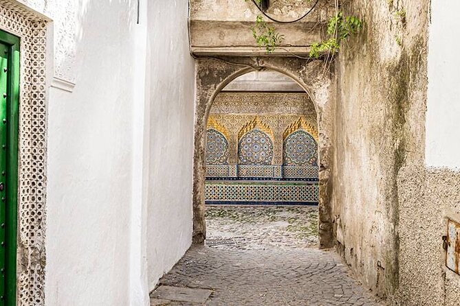 Casablanca to Tangier Day Trip By High-Speed Train and Camel Ride - Petit Socco, the Grand Mosque, and the old city