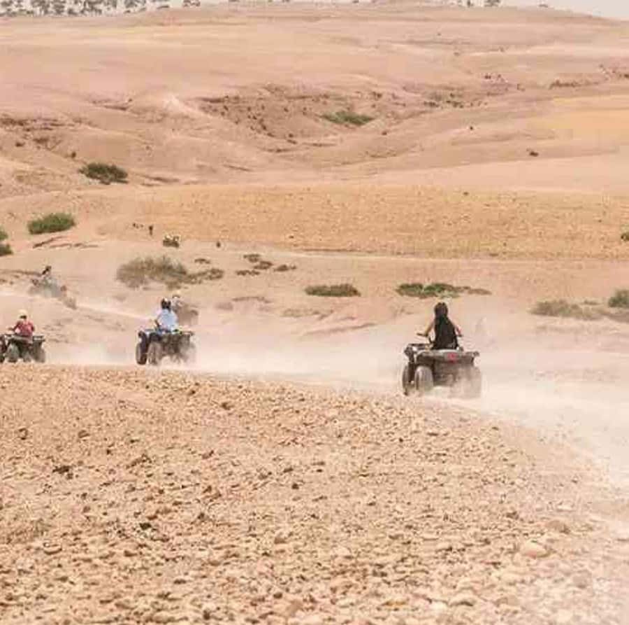 Dinner show in agafay Desert 1h quad bike & 20 min camels - Berber Music, Dancing, and the Fire Show