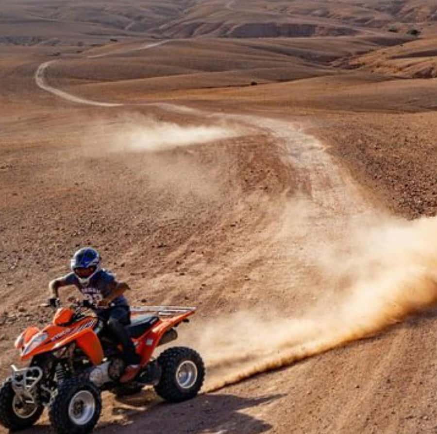 Dinner show in agafay Desert 1h quad bike & 20 min camels - The 70-Minute Quad Ride Across Agafay