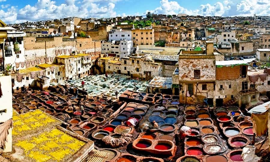 Explore Fes: Unforgettable Guided Walking Tour of the Medina - Entering the souks and medieval lanes