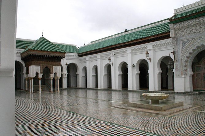 Fes Guided Sightseeing Tour with Luxury Car All Inclusive Tickets - Entering the Medina with a local guide