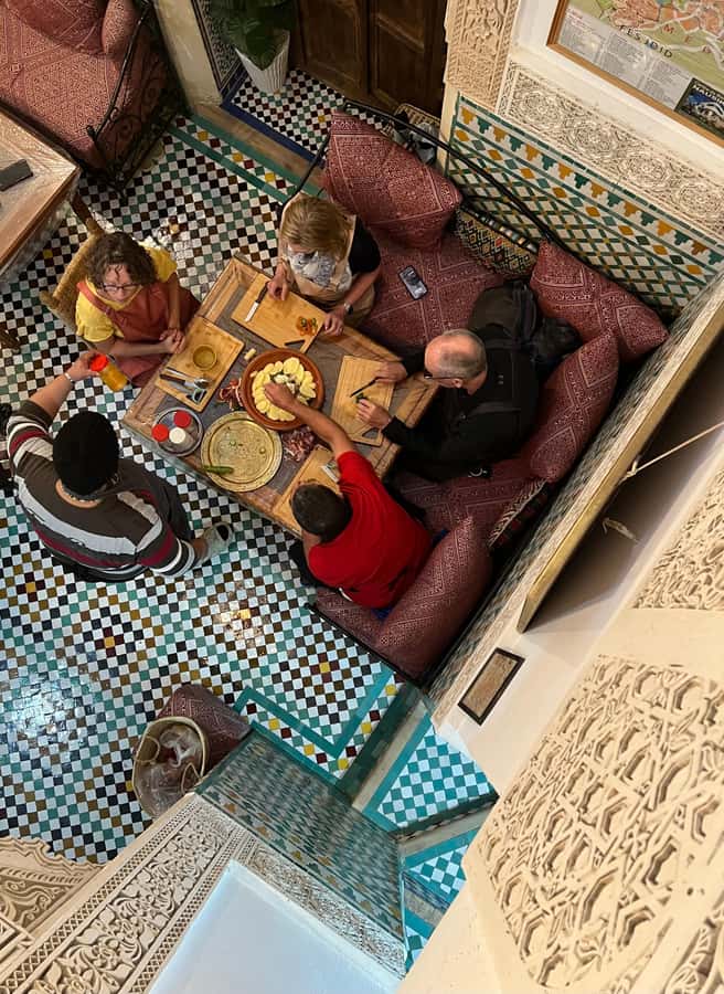 Fez: Souk Tour and Traditional Home Cooking Class - Mint tea and menu planning at Dar Sunrise