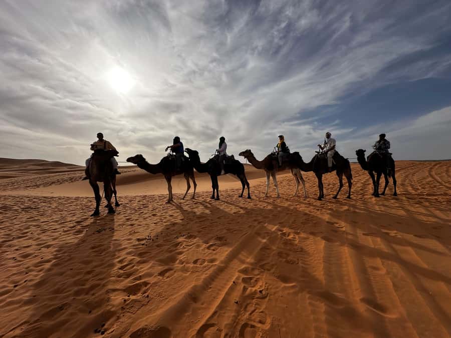 From Marrakech: 3-Day Sahara Tour with Private tent & Meals - Night two: Dinner, drums, and sleeping in the dunes