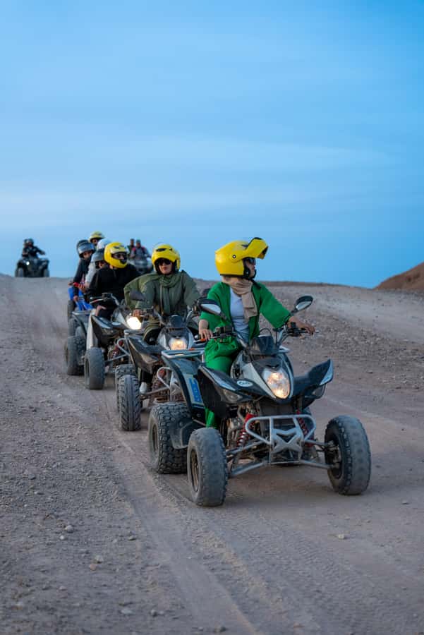 From Marrakech: Agafay Desert Quad Biking with Dinner & Show - Riding across the dunes with the Atlas Mountains behind you