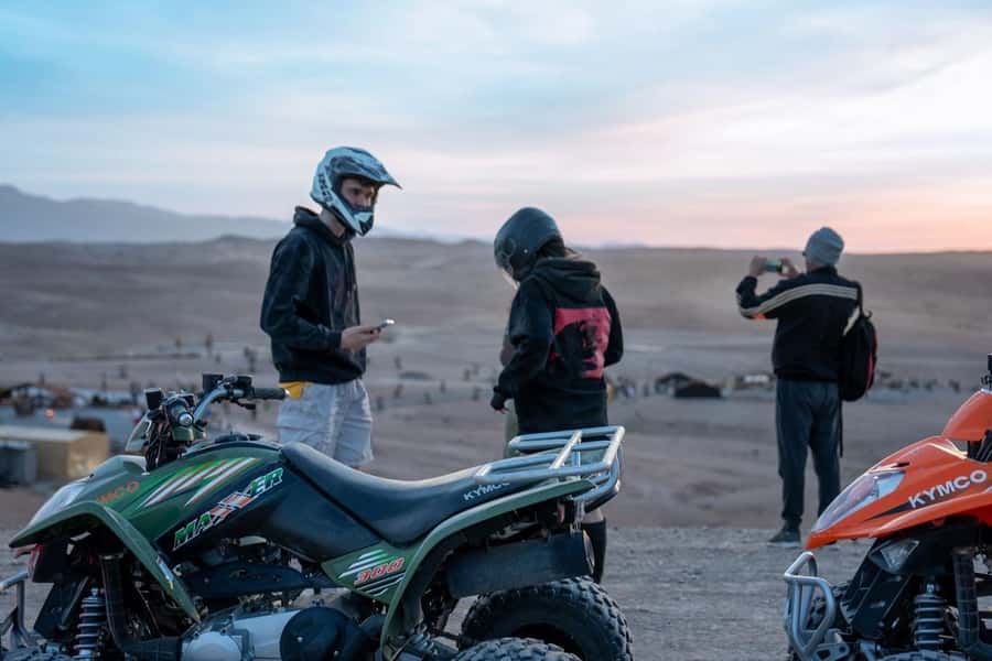 From Marrakech: Agafay Desert Quad Biking with Dinner & Show - Berber tea and a meal in a nomadic tent