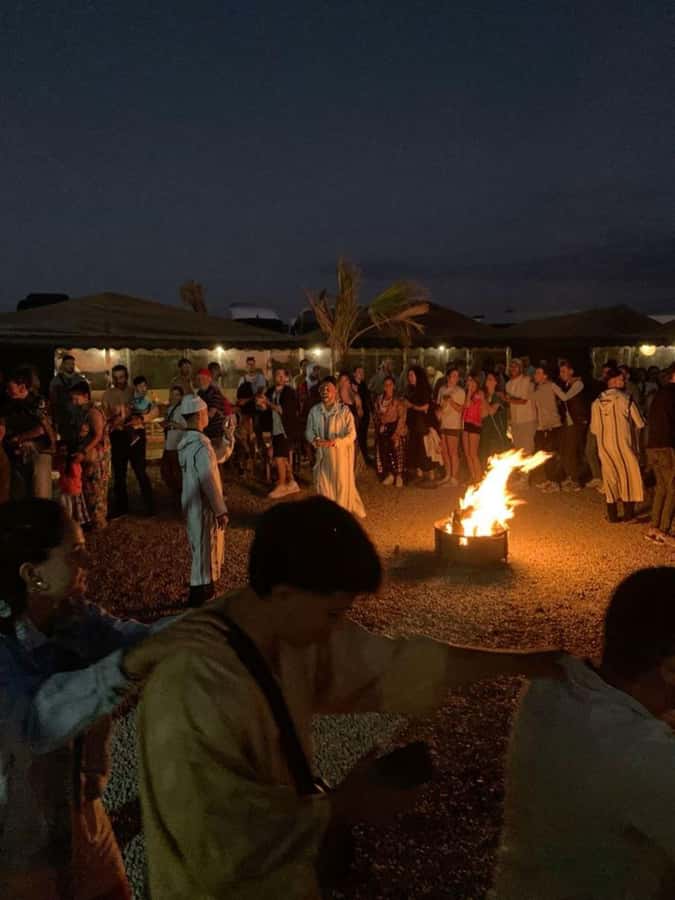 From Marrakech: Camel, Quad Bike Tour, Sunset, Dinner & Show - Sunset camel ride across rocky ground