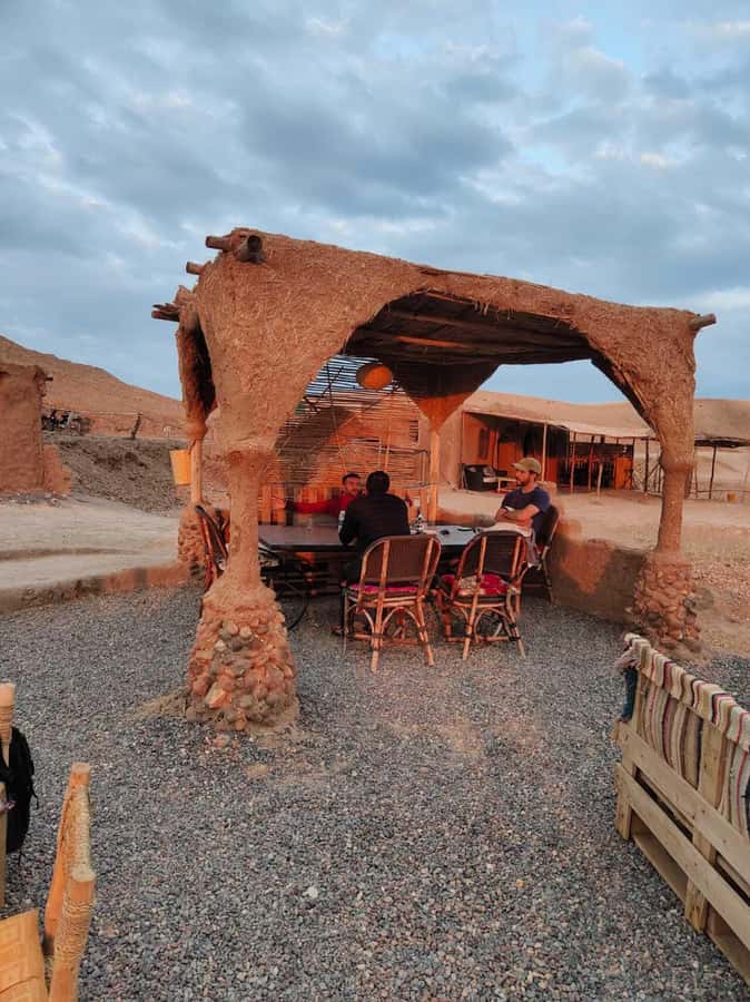 From Marrakech: Camel, Quad Bike Tour, Sunset, Dinner & Show - Moroccan dinner beneath Berber-style tents