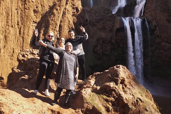 From Marrakech: Full-Day Tour to Ouzoud Waterfalls with Boat Trip - Orange juice, swimming, and lunch above the river