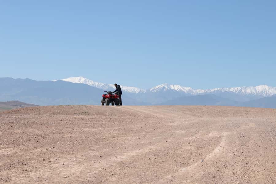 From Marrakech: Guided Quad Biking Tour in Agafay Desert - The Lalla Takerkoust Lake tea stop