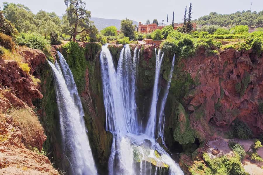 From Marrakech: Ouzoud Waterfalls Guided Hike and Boat Tour - A steep walk from the rim to the river