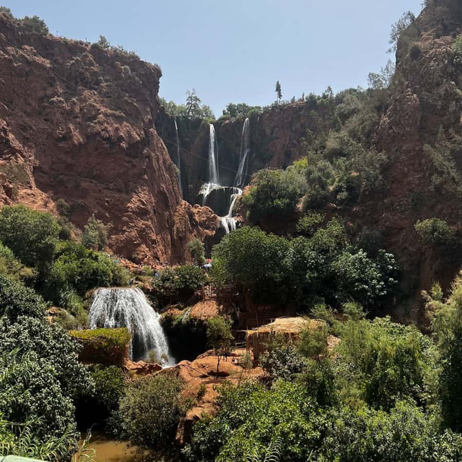From Marrakech: Ouzoud Waterfalls Guided Tour and Boat Ride - Lunch beside the falls, with tajine on the menu