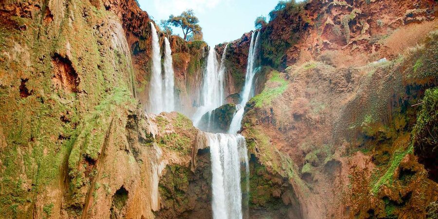From Marrakech: Ouzoud Waterfalls Guided Tour & Boat Ride - The boat ride beside the falling water