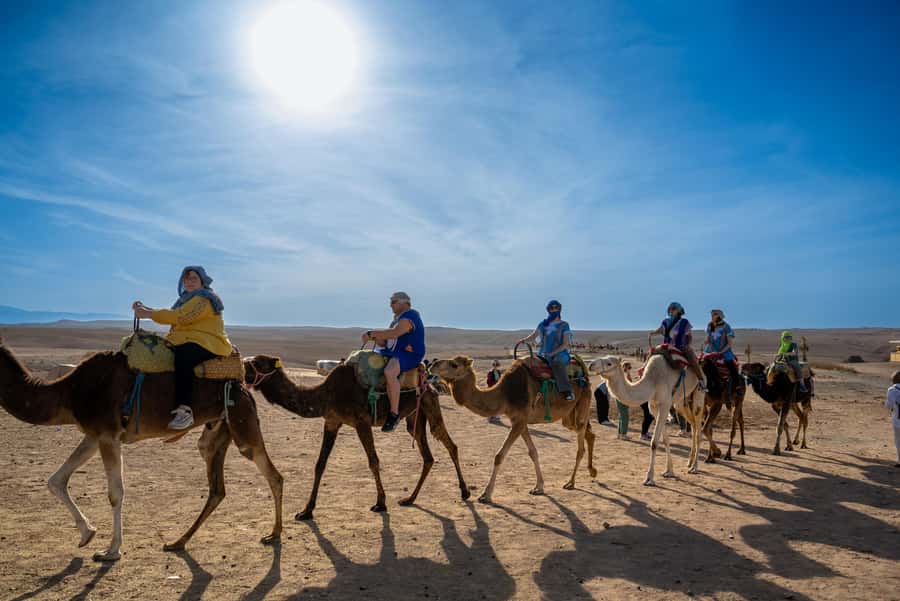 From Marrakech: Sunset Desert Tour with Camel Ride & Dinner - Berber music, dancing, and the fire show