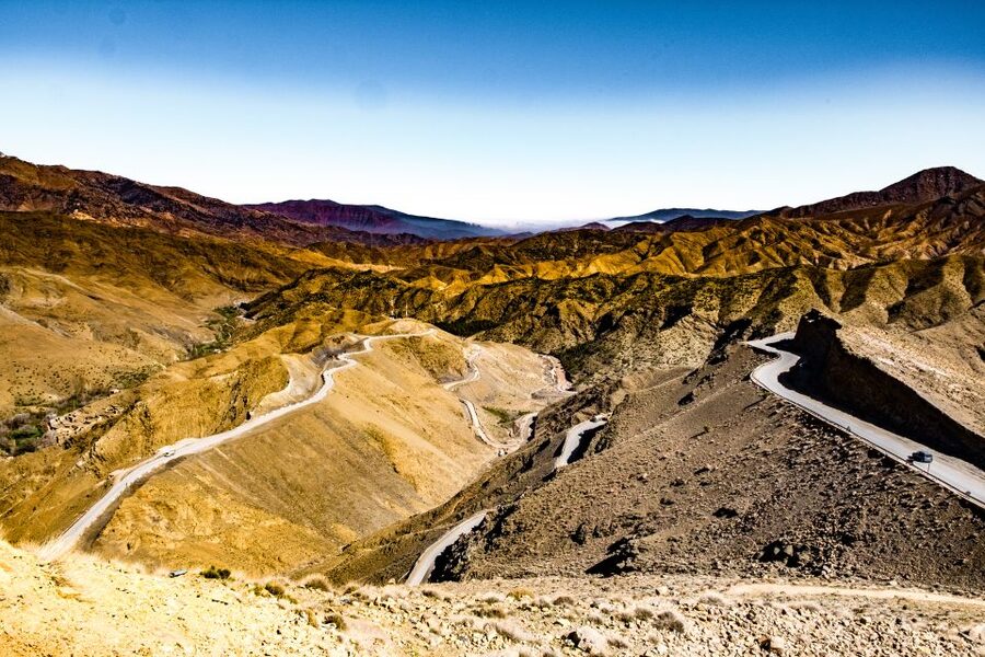 From Marrakech: Zagora 2-Day Desert Safari with Food & Camp - Riding camels into the Zagora sunset