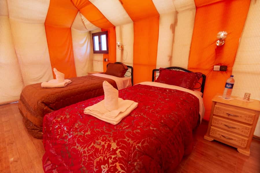 From Merzouga: Desert Overnight in Heated Tent & Camel Ride - Sandboarding, tea, and a Berber welcome