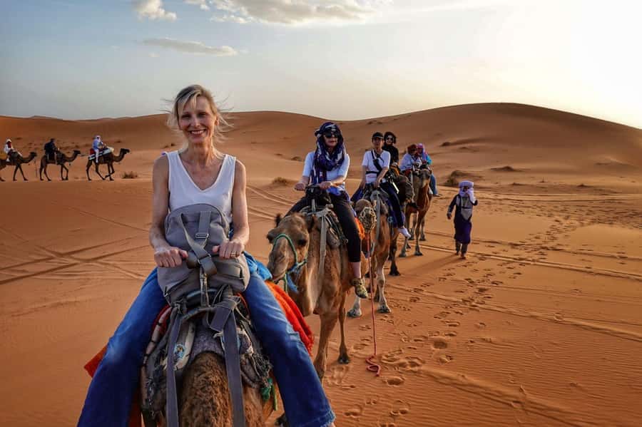 From Merzouga: Overnight Camel Trek over Erg Chebbi Dunes - A Moroccan dinner and drums around the fire