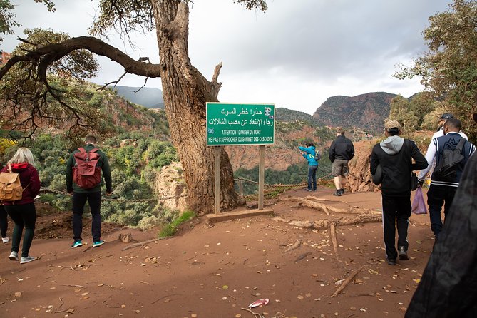 Full Day Trip To Ouzoud Waterfalls From Marrakech & Boat Tour - The steep path down to the river