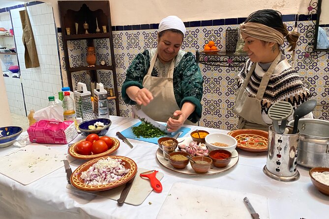 Half-Day Cooking Class with Local Chef Laila in Marrakech - Preparing the main course with Ras El Hanout