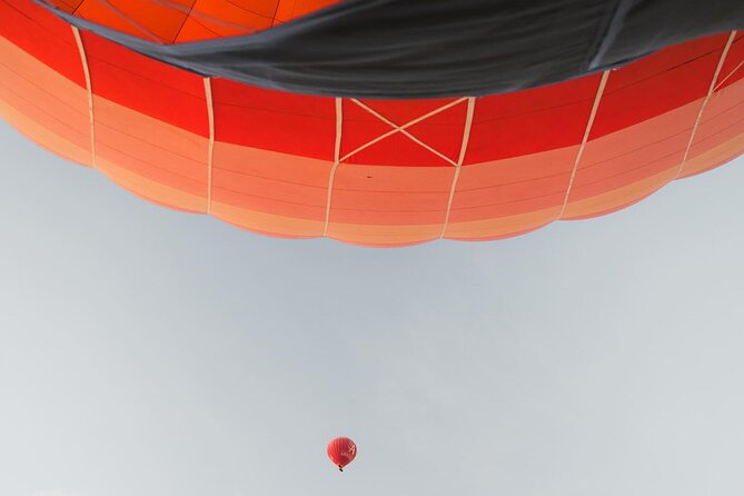Hot Air Balloon Flight over Marrakech with Traditional Breakfast - Above Marrakech with the Atlas Mountains ahead