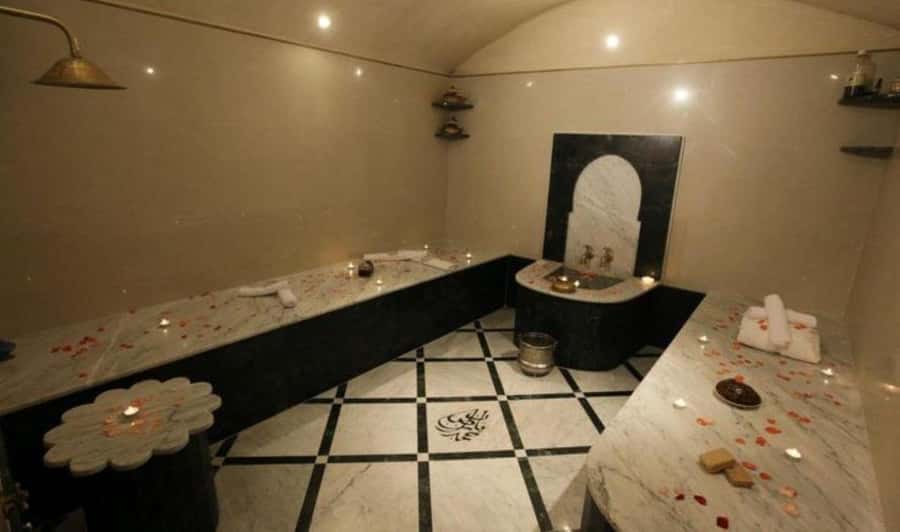 Marrakech: 3H Traditional Hammam & Massage & Hotel Transfer - Entering the hammam: heat, black soap, and the kessa glove