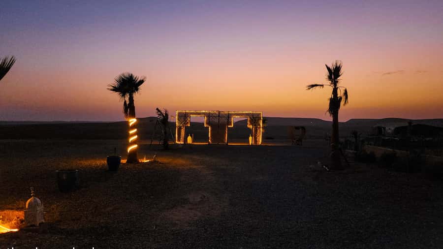 Marrakech: Agafay Camel Ride & Dinner with Fire Show Tour - A 20-minute camel ride at sunset
