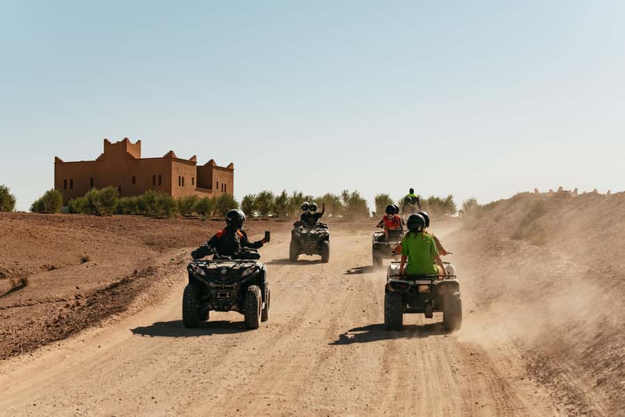 Marrakech: Agafay Desert Pool, Dinner & Live Show Experience - A Moroccan dinner under a decorated tent