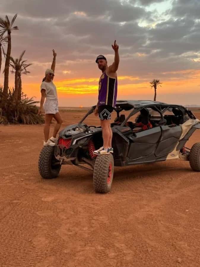 Marrakech: Agafay Desert Quad Bike & Camel Ride with Dinner - Riding a camel as the sun drops