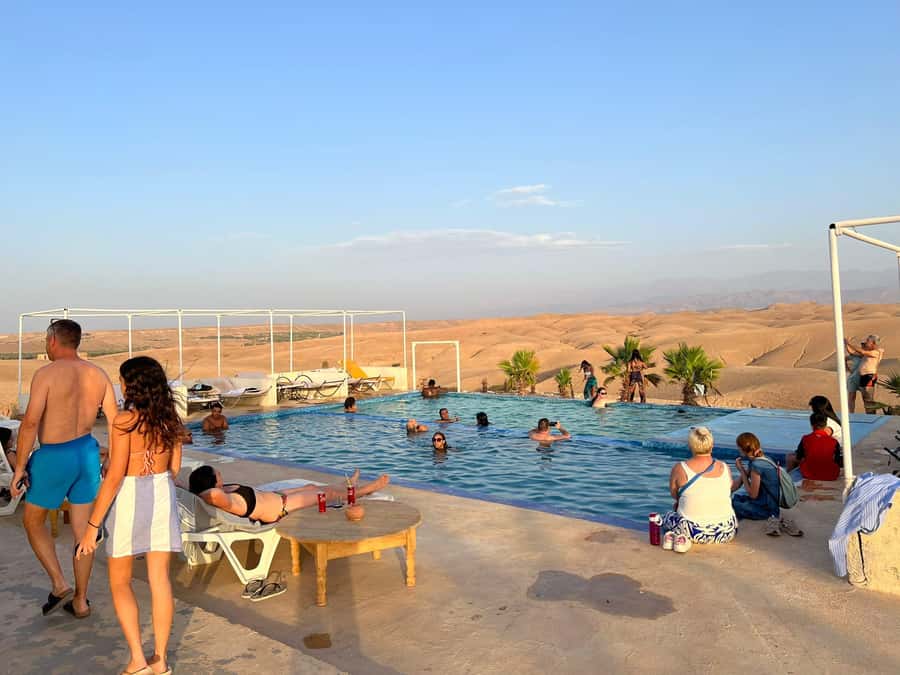 Marrakech: Agafay Desert Quad Camel Rides, Pool, Dinner Show - Quad biking across Agafay’s rocky terrain