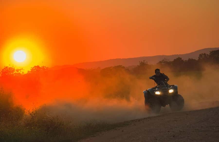 Marrakech: Agafay Desert Tour Quad bike & Dinner fire show - Quad biking across Agafay’s rocky ground
