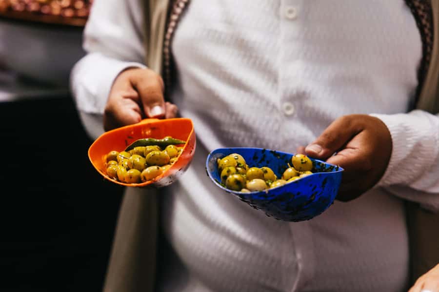 Marrakech: Authentic Moroccan Food Walking Tour & Dinner - Msemmen, mint tea, olives, and family-style snacks
