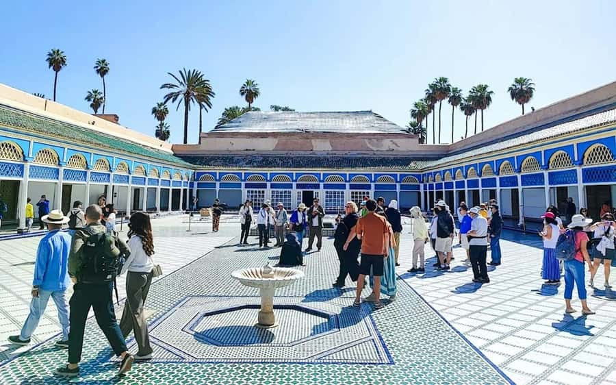 Marrakech: Bahia Palace, Saadian Tombs & Medina Walking Tour - The Kasbah and Bab Agnaou show royal Marrakech