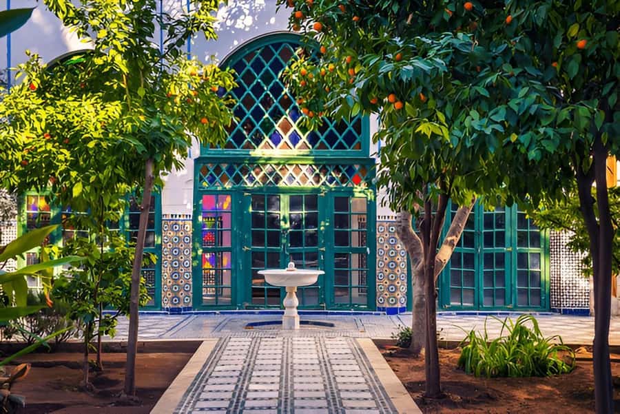 Marrakech: Ben Youssef, Secret Garden, & Souks Walking Tour - Through the Medina and into the souks