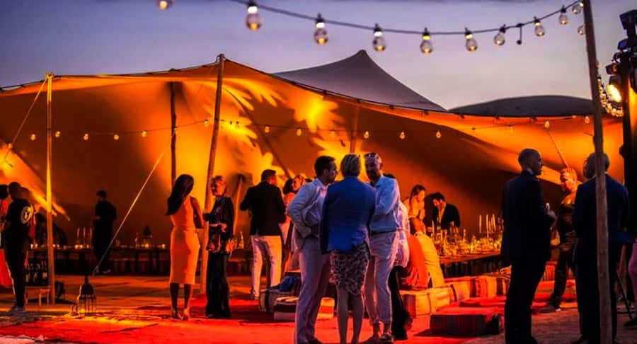 Marrakech: Camel Ride, Dinner, Pool, and Fire Show in Agafay - Music, dancing, and a lively shared evening