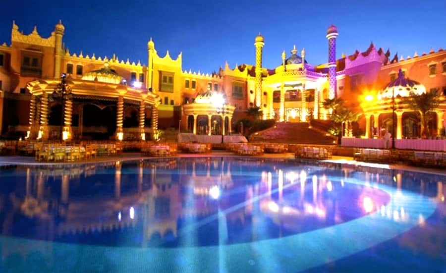 Marrakech: Chez Ali Fantasia Folklore Show & Moroccan Dinner - Arriving at the gates, knights, and Ali Baba cave