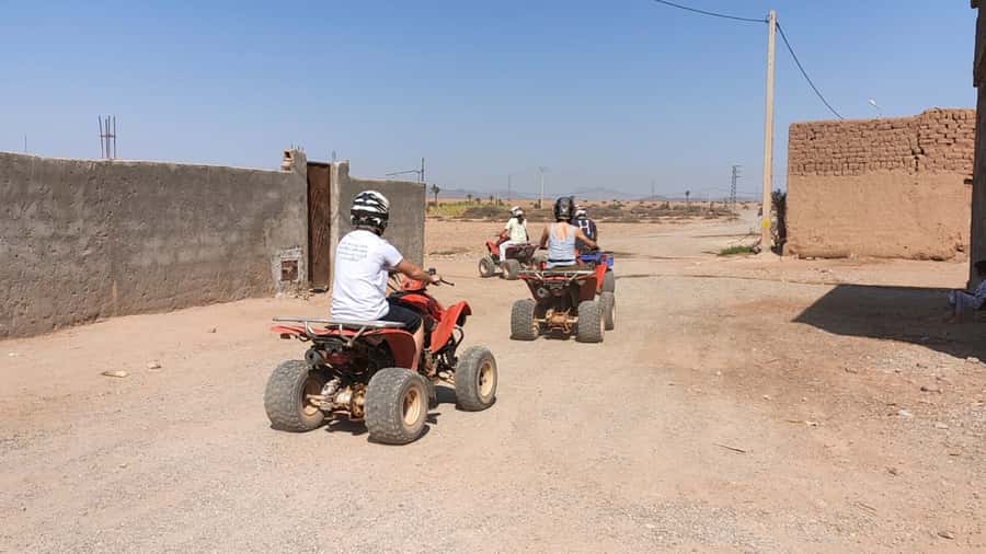Marrakech Desert & Palm Grove Quad Bike Tour - Returning through rural Berber villages