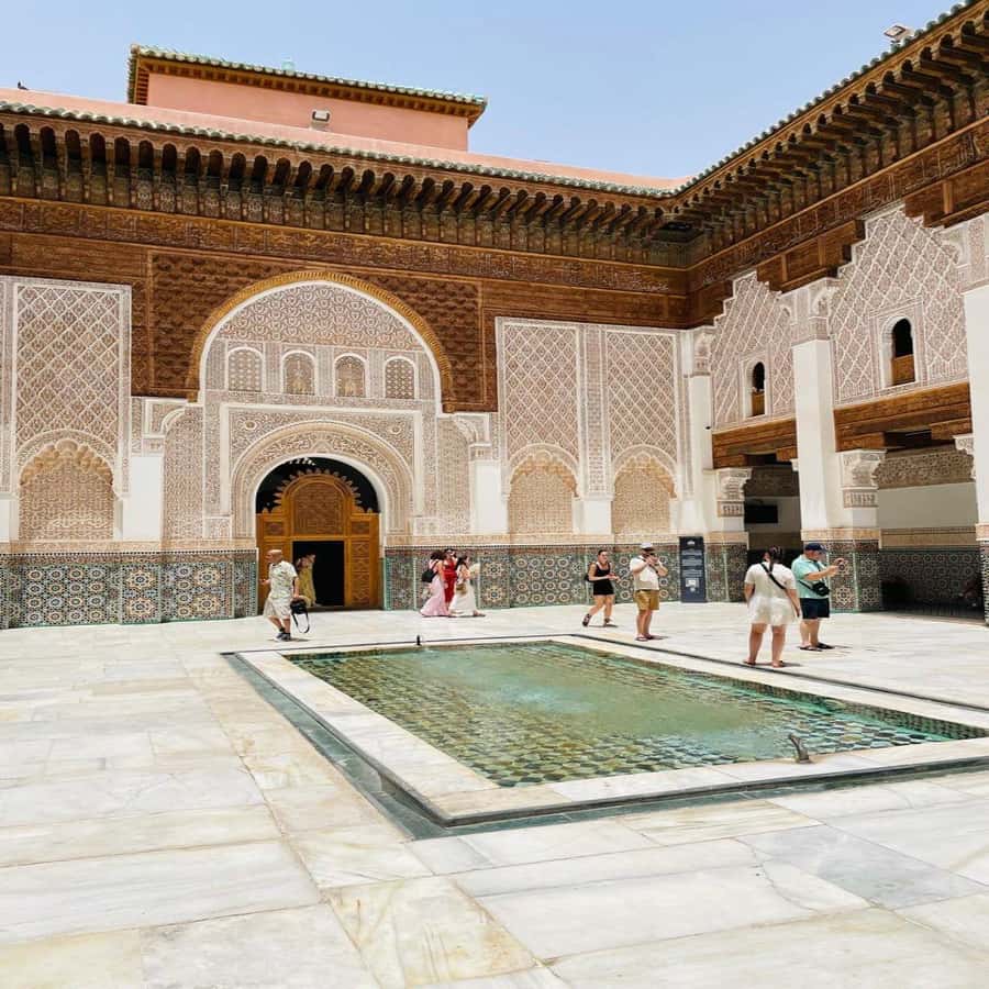 Marrakech: Madrasa Ben Youssef, Secret Garden & Medina Tour - Ben Youssef Madrasa and its detailed decoration