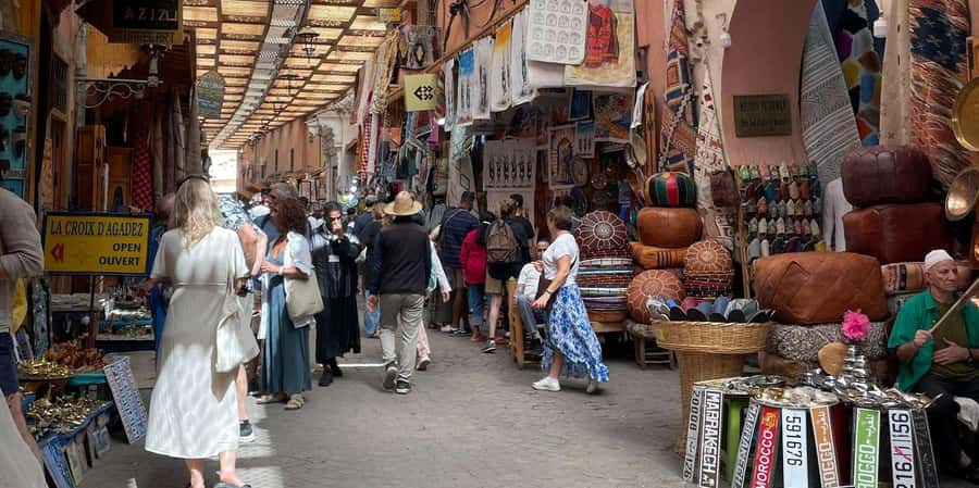 Marrakech: Madrassa Ben Youssef, Secret Garden & Medina Tour - Walking through Souk Semmarine