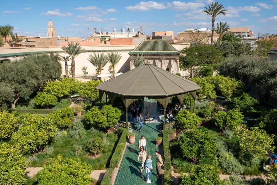 Marrakech: Madrassa Ben Youssef, Secret Garden & Medina Tour - The tiled courtyards of Ben Youssef Madrasa