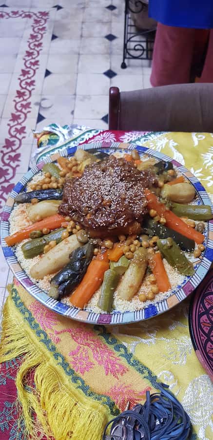 Marrakech: Moroccan Cooking Class with a Local Family - The spice lesson before the knives come out