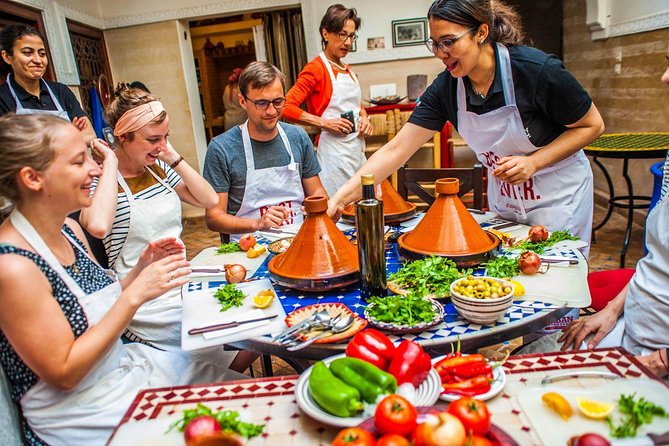 Marrakech Tour: Tajine Cookery Class Experience - Cooking chicken tagine in a riad kitchen
